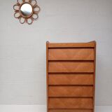High wooden chest of drawers in the 50s