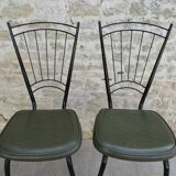 Pair of black metal chairs and khaki green skai, 60s
