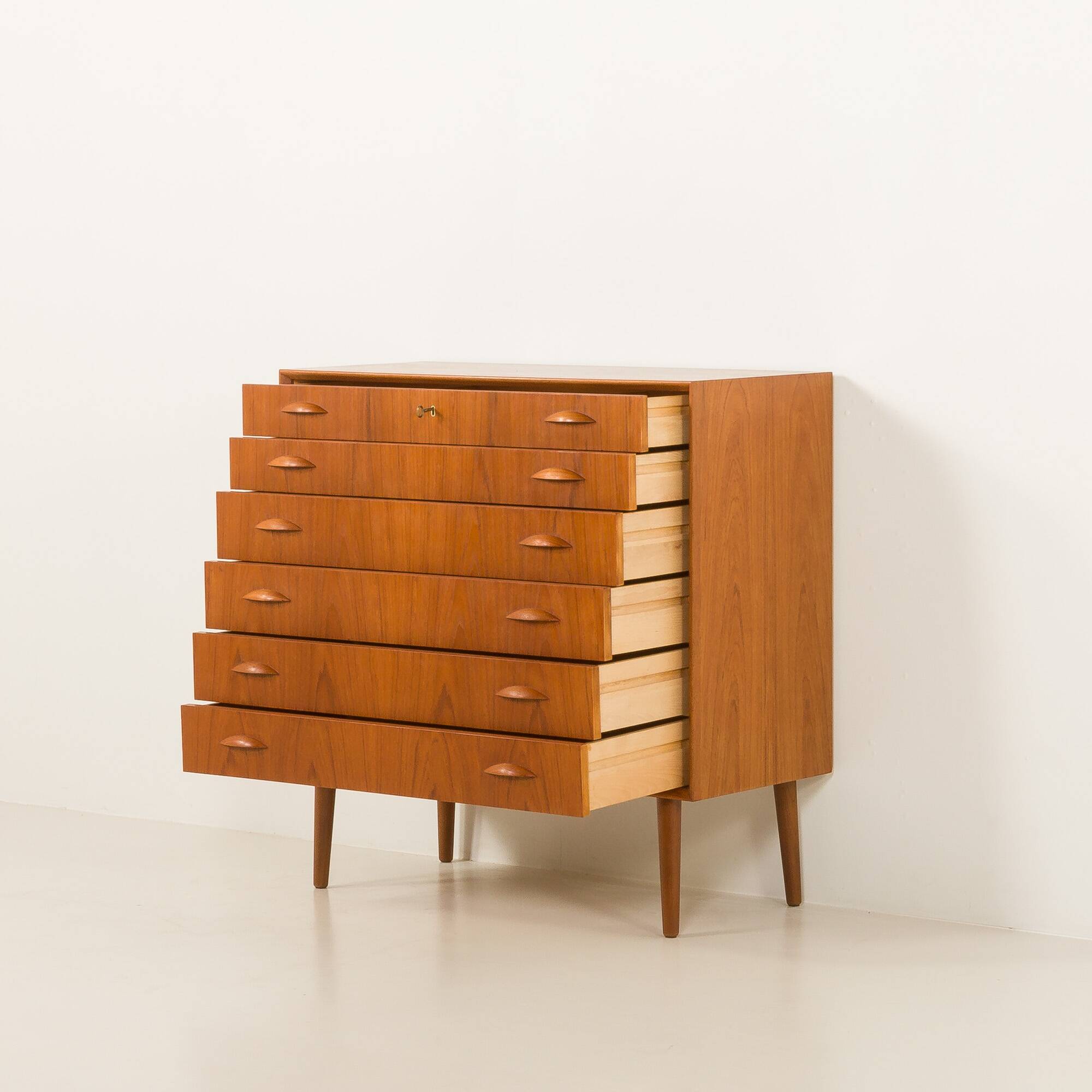 Scandinavian teak chest of drawers by Johannes Sorth for Nexo Mobelfabrik.
