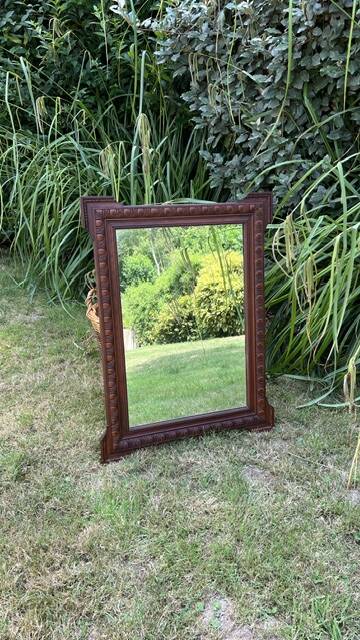 Antique carved wooden mirror