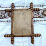 Antique mercury mirror in bamboo-style wood