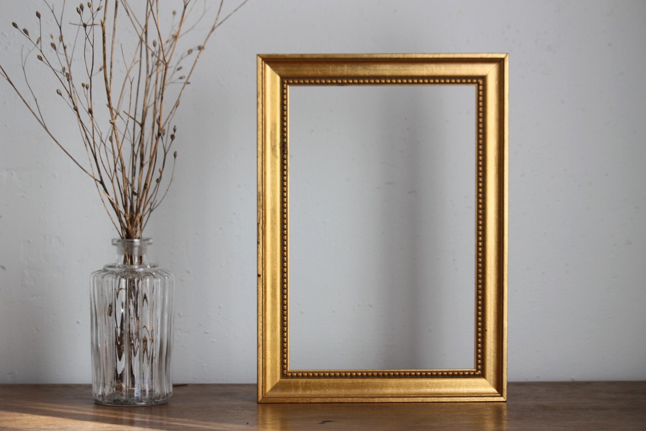 Carved and moulded gilded wood frame