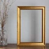 Carved and moulded gilded wood frame