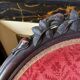 Napoleon III medallion armchair in carved wood and red velvet.