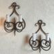 Old pair of wrought iron wall lights