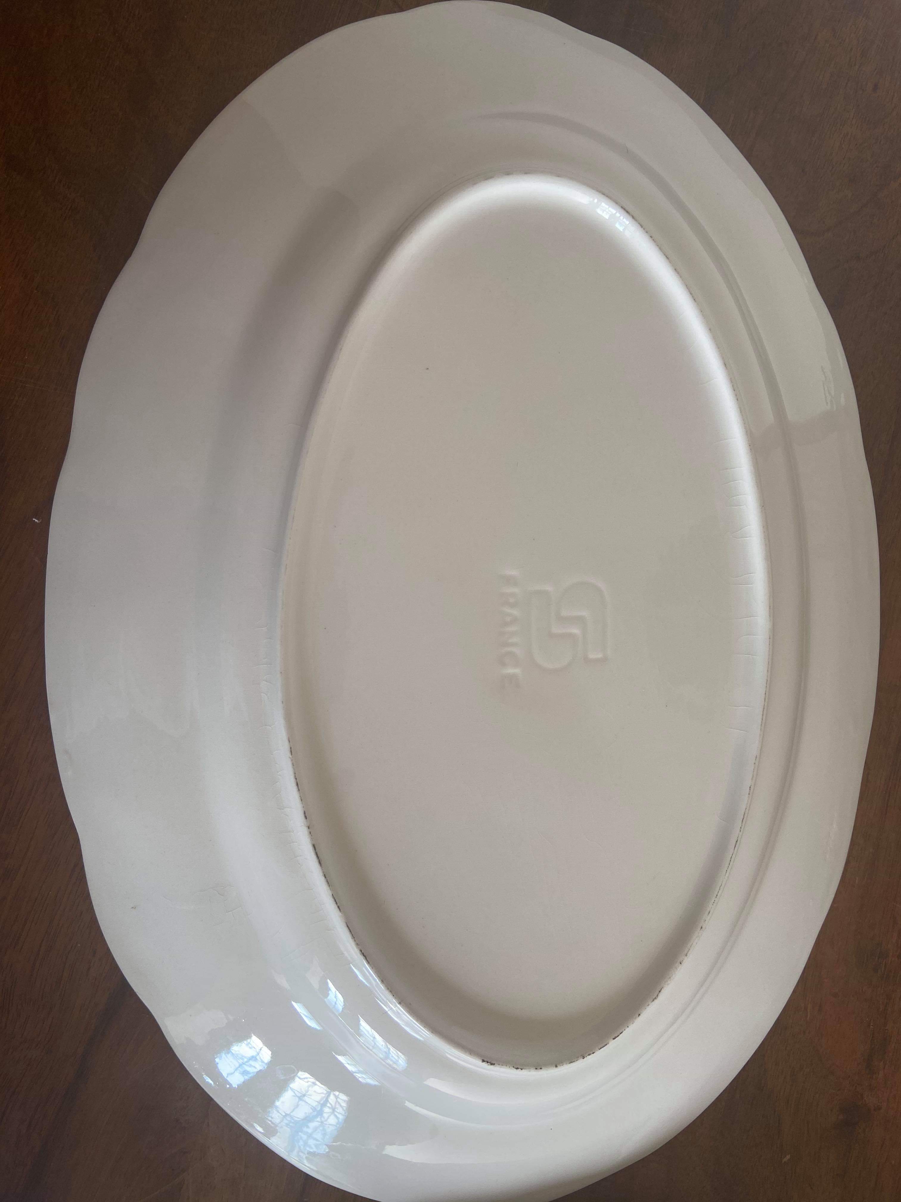 Lot of four flat plates and a dish