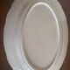 Lot of four flat plates and a dish