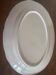 Lot of four flat plates and a dish