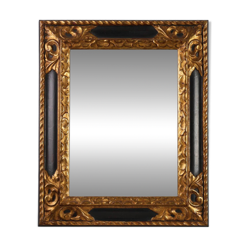 Miroir baroque en bois noir et doré sculpté, France années 1850.