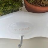 Enamelled sheet metal with inscriptions and hooks