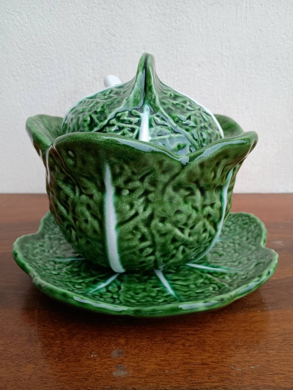 Soup tureen and cabbage slipware dish