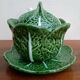 Soup tureen and cabbage slipware dish