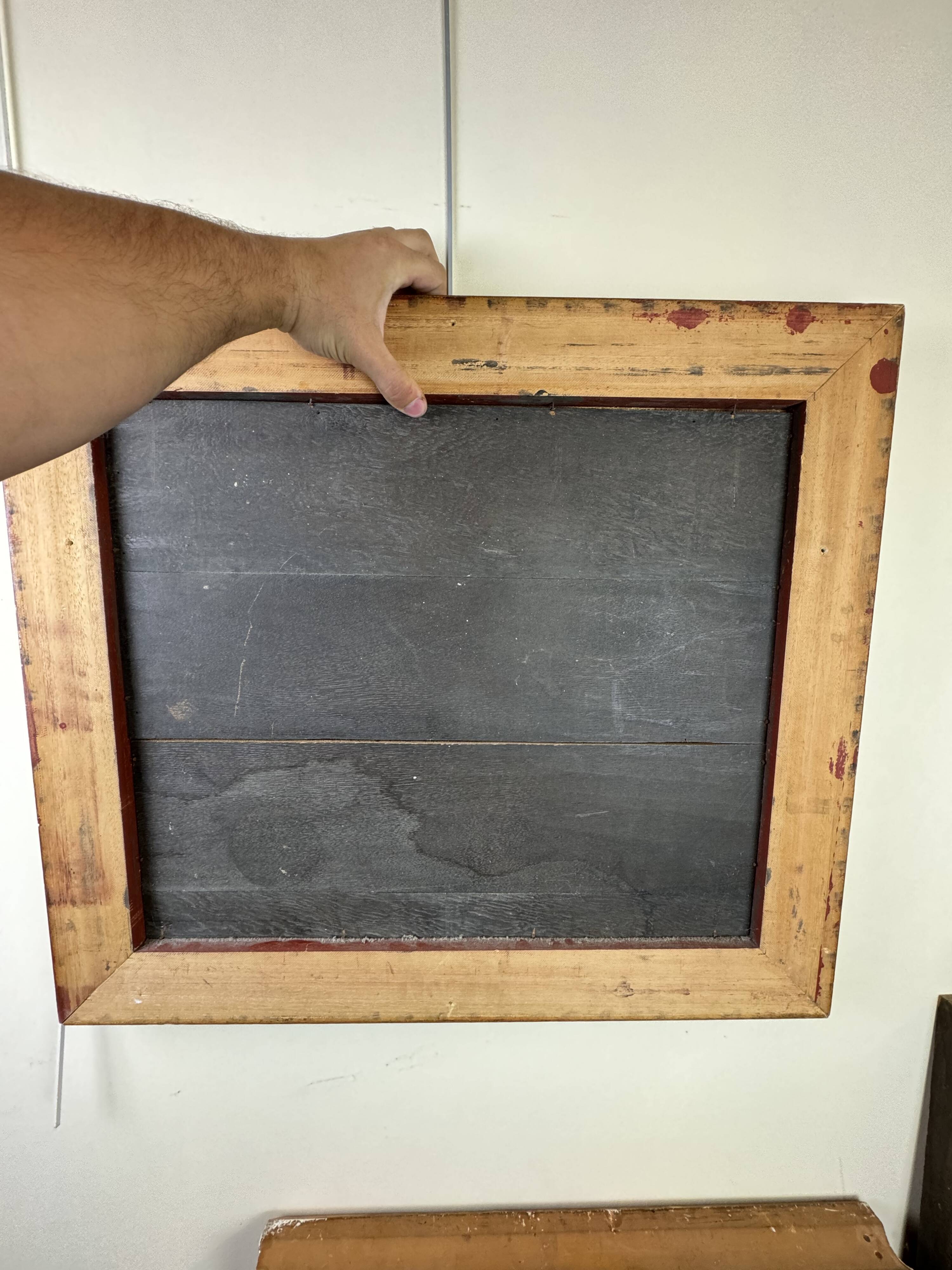 French School, early 20th century: oil on panel, lively street in Brittany