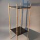 Pedestal table in patinated gilded brass faux foldable bamboo.