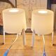 Pair of white Ikea Tvärs bedside lamps