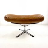 Brown leather ottoman on chrome base