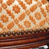 Old wooden and velvet bench