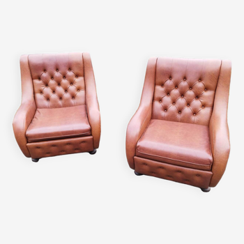 Pair of brown leatherette armchairs