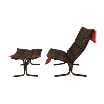 Siesta chair and ottoman, black leather with red backin, by Ingmar Relling