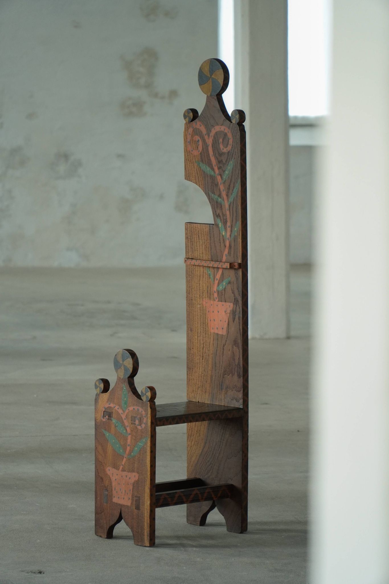 Danish popular art chair with a high back, made of oak, featuring hand-painted decoration, dated 1876.