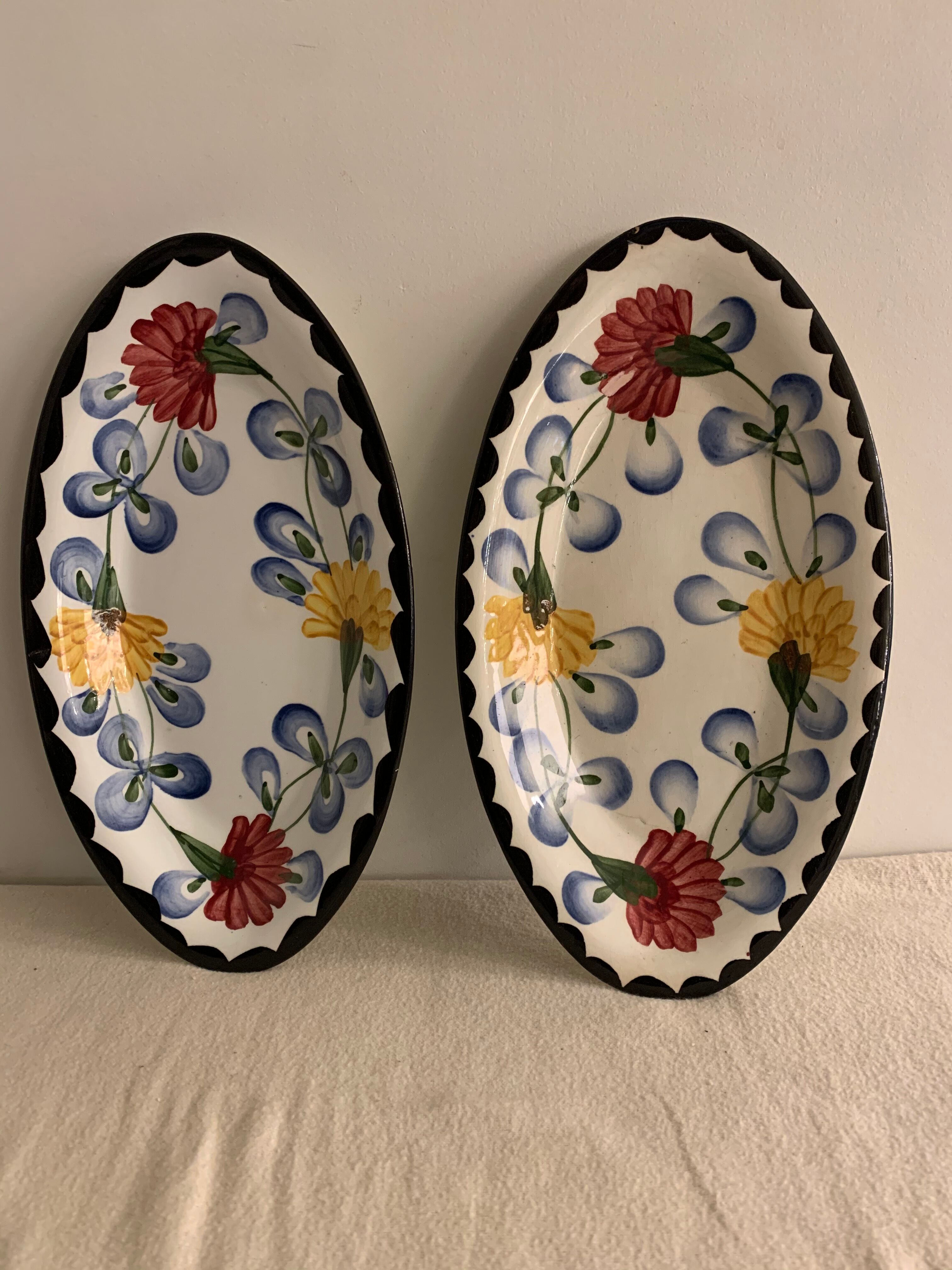 Pair of floral ravines in ancient earthenware Onnaing and CM Paris model Clovers