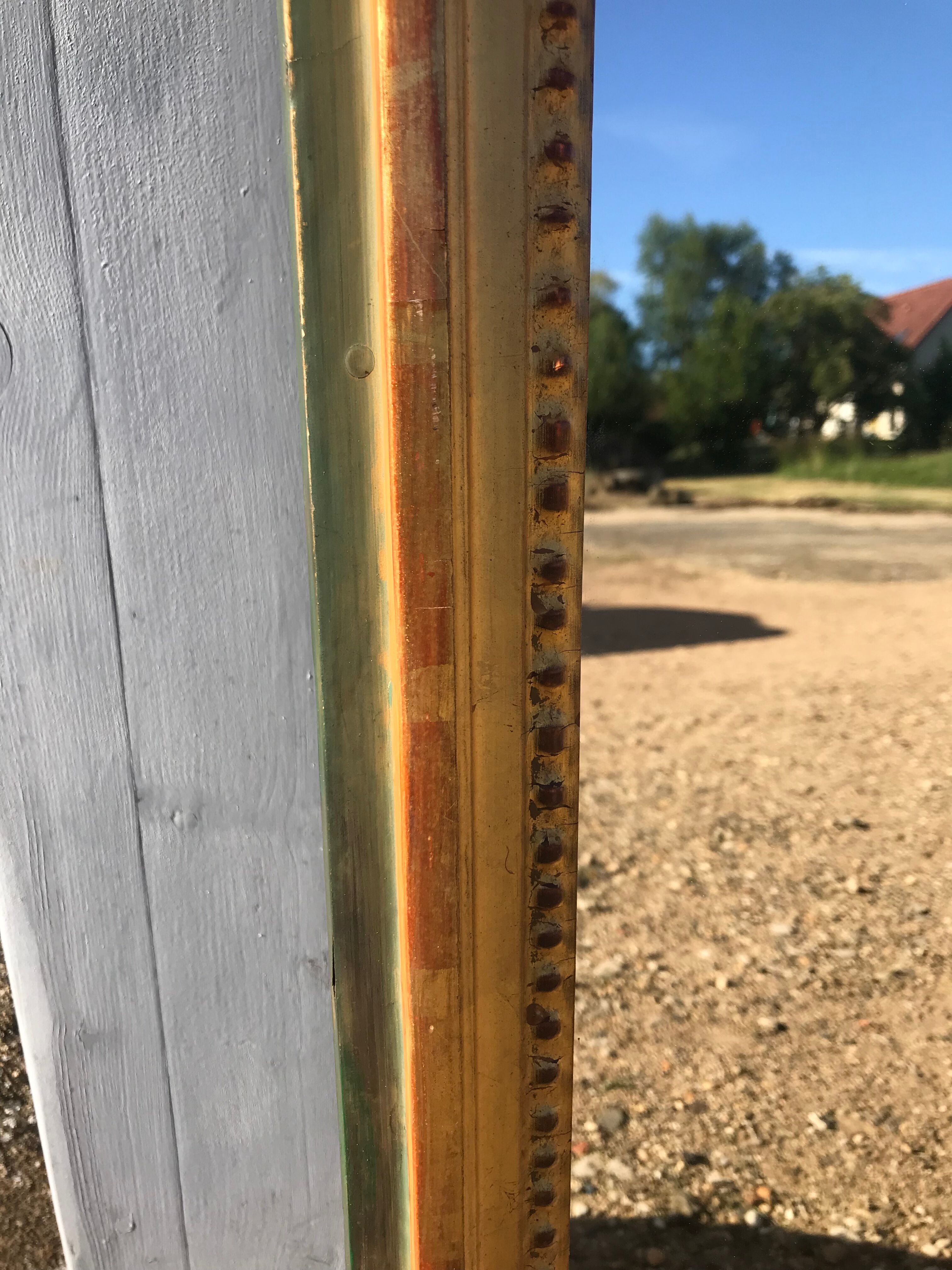 Mirror Louis XVI in between golden with gold leaf 50x150cm