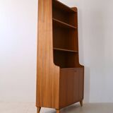 Vintage bookcase with storage compartment