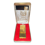 Lighter with its golden box