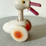 Ancien jouet à pousser, canard en bois