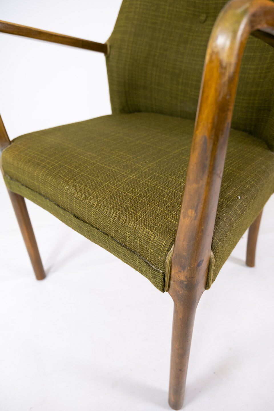 Armchair in birch and orginal dark green fabric of danish design from the 1950