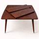 Vintage extendable table from the 1960s in formica with a Scandinavian rosewood effect.