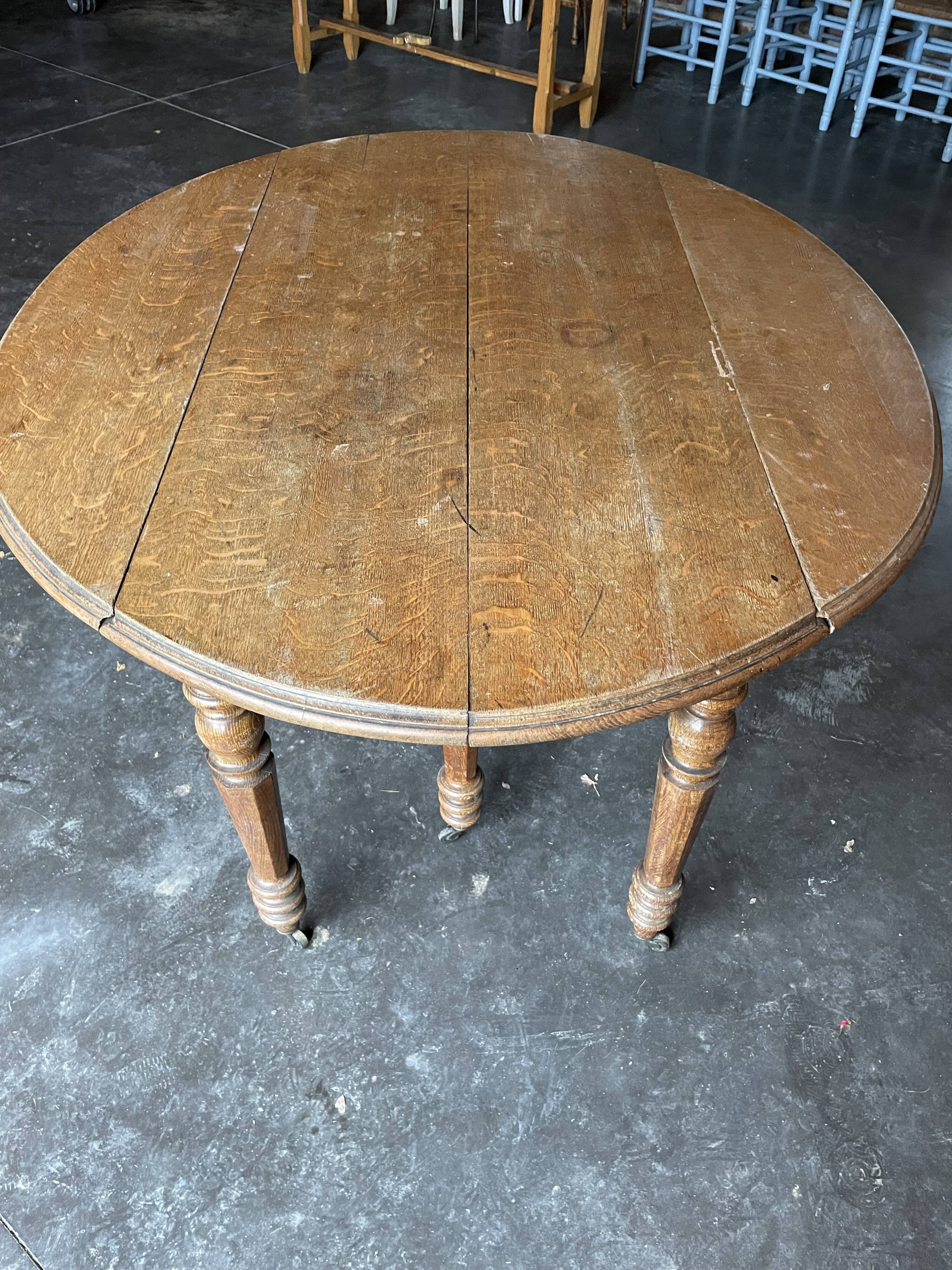 Old wooden table with folding flaps