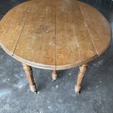 Old wooden table with folding flaps