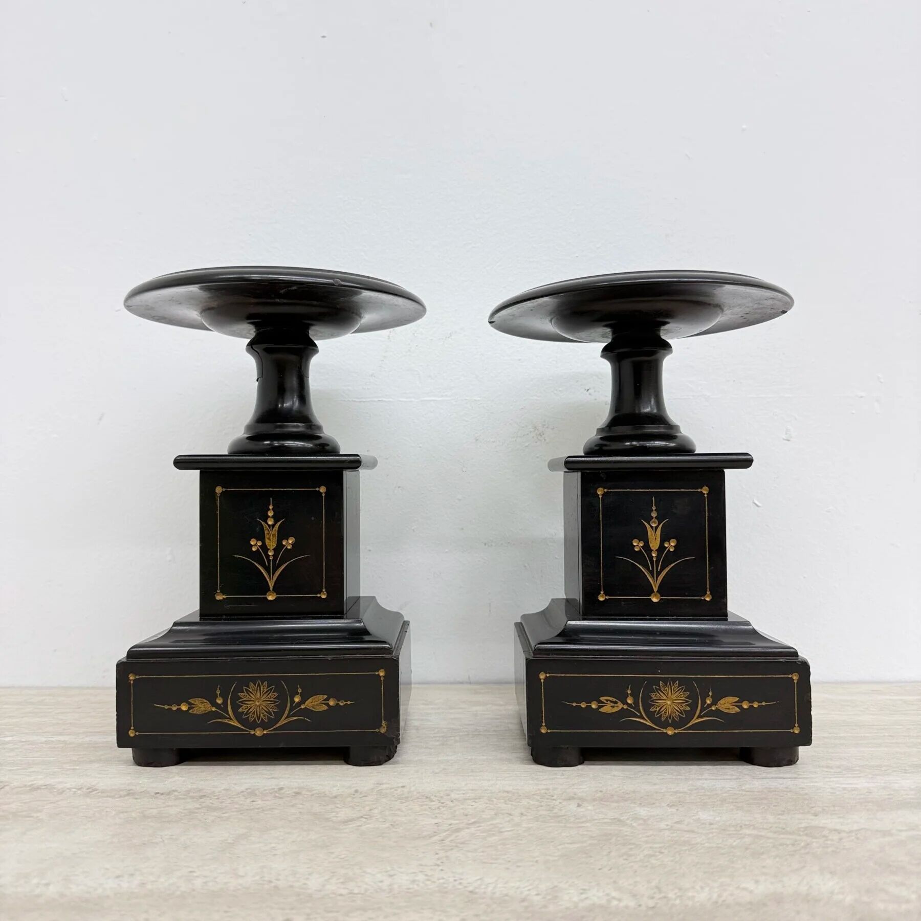 Antique French black marble cassoulets gilt decor pedestals neoclassical pair, 1900s