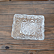 Rectangular whisky carafe made in France with geometric patterns.