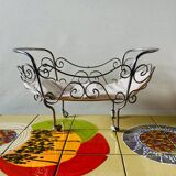 Metal doll's bed on vintage casters