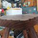 Vintage tripod stool in carved solid wood.