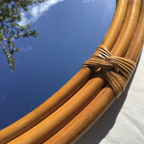 Natural rattan oval mirror bound