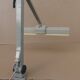 WALDMANN articulated workshop lamp with two industrial clamp arms for architects.