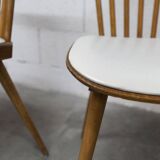 Pair of Baumann Menuet chairs, Honey patina, White vinyl seats