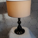 Table lamp in black lacquered turned wood.