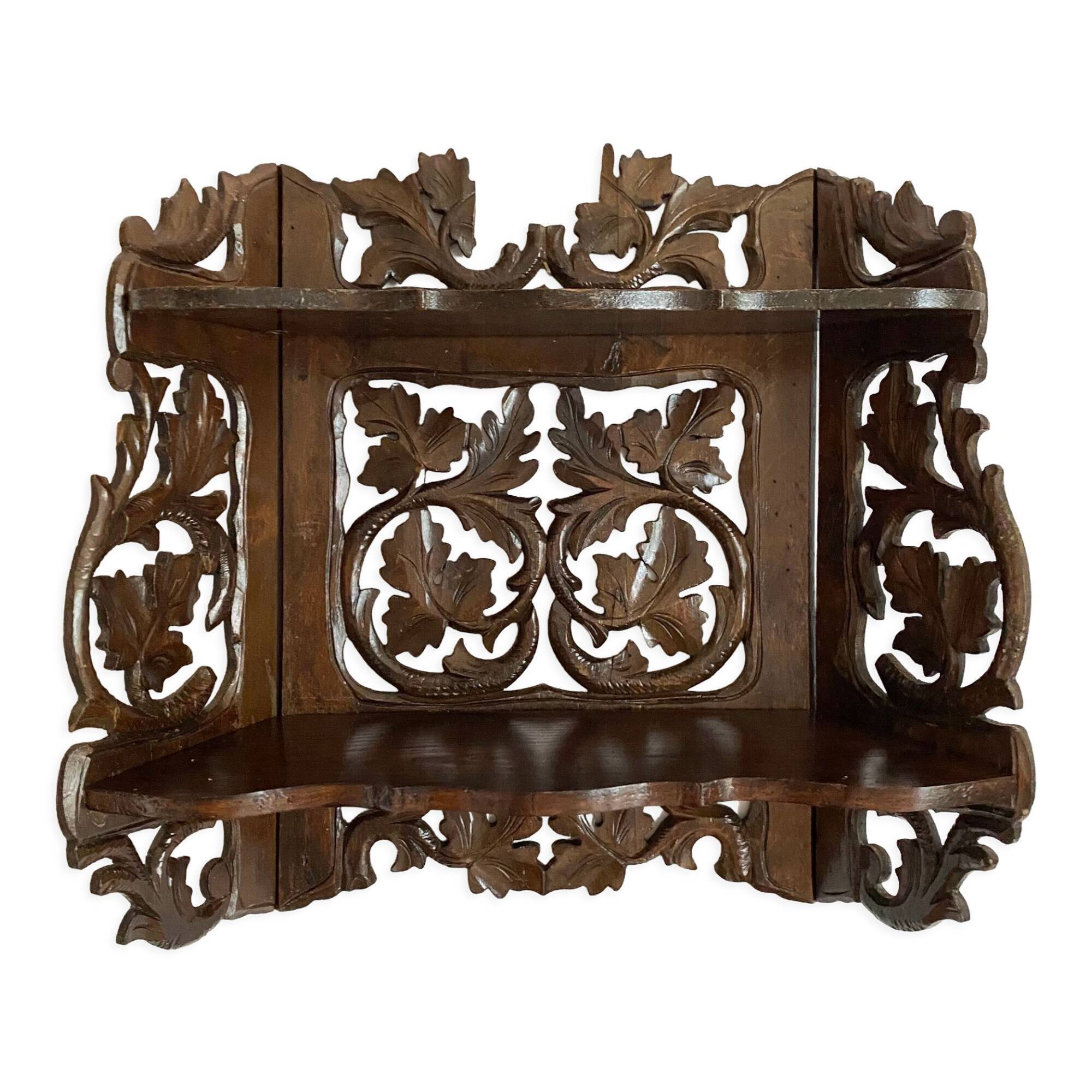 Carved wooden wall shelf