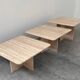 Set of three Italian travertine nesting / side tables, 1970s–1980s