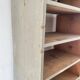 Large antique workshop cabinet with patinated wooden compartments, 20th century.