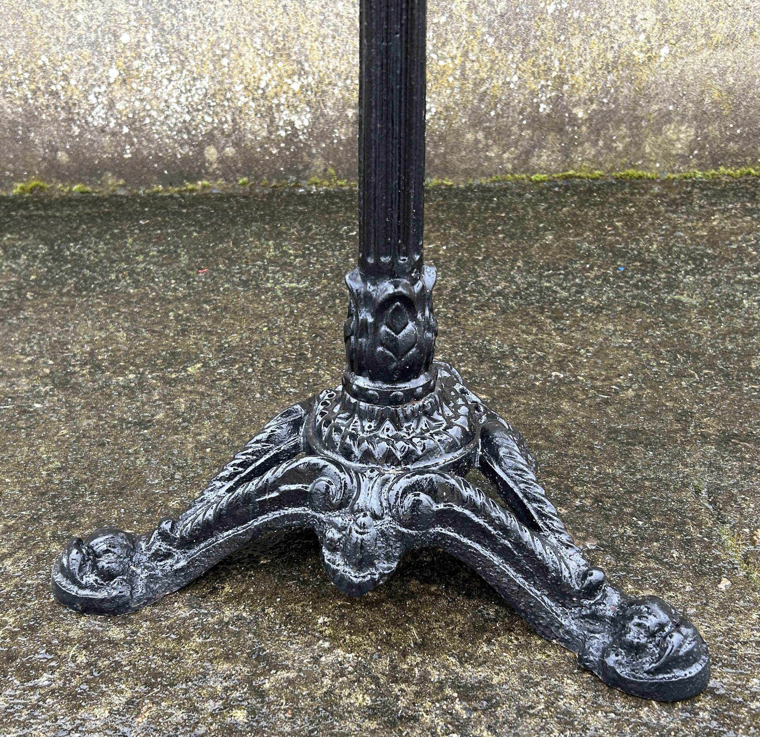 Round bistro table, cast iron legs, vintage, 1940s