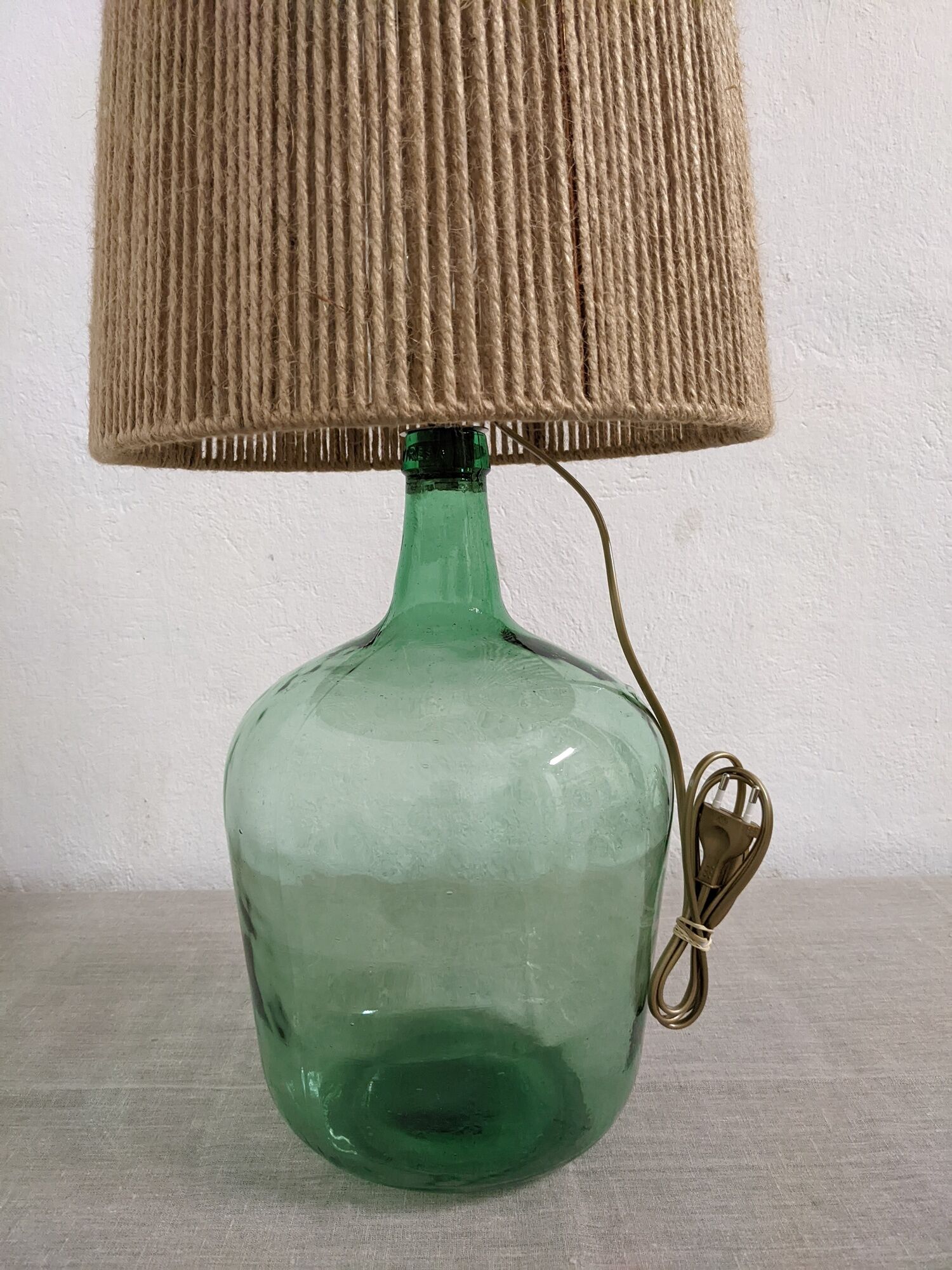 Vintage demijohn lamp in glass and XXL jute rope