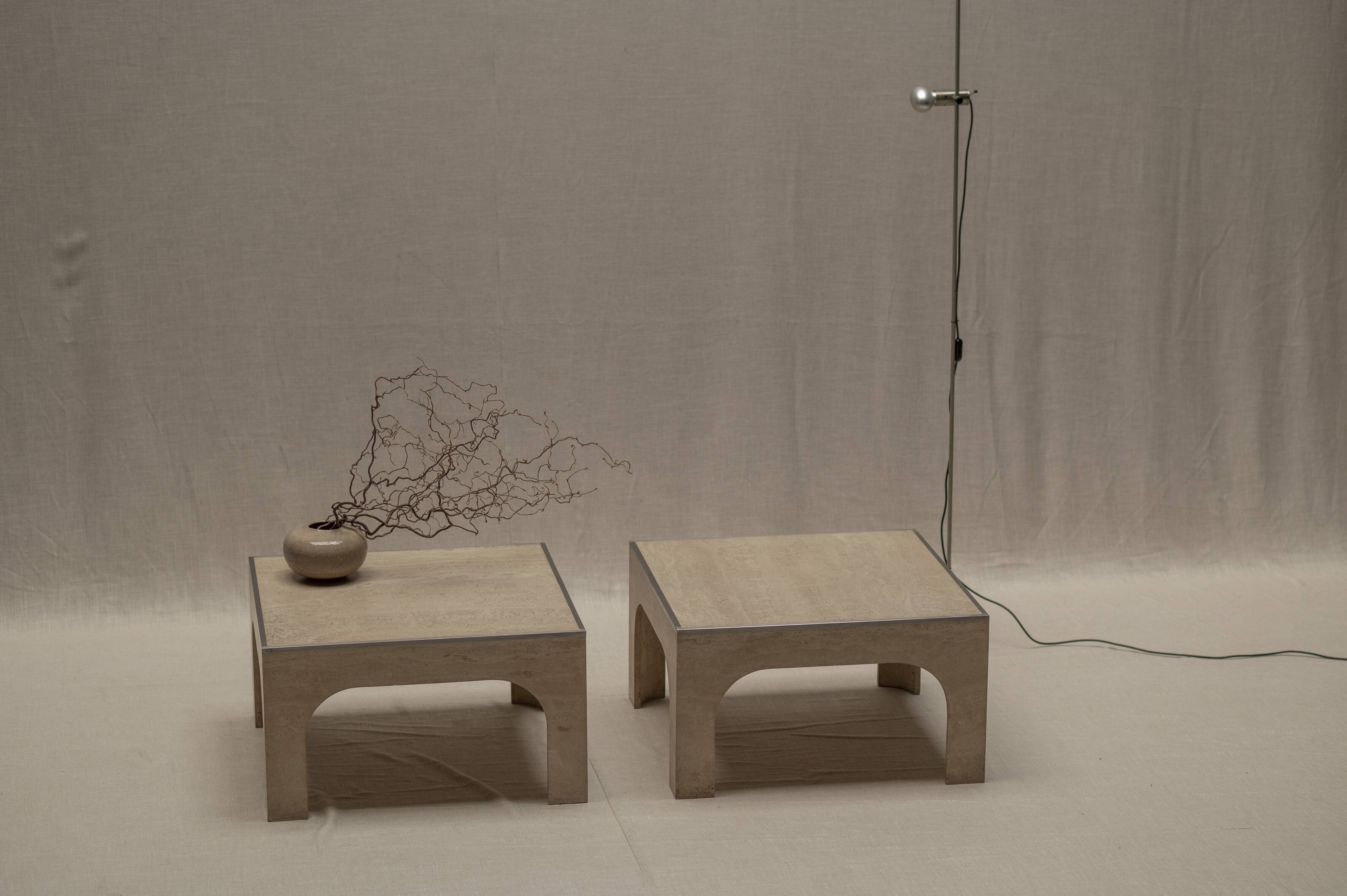 Architectural set of travertine coffee tables