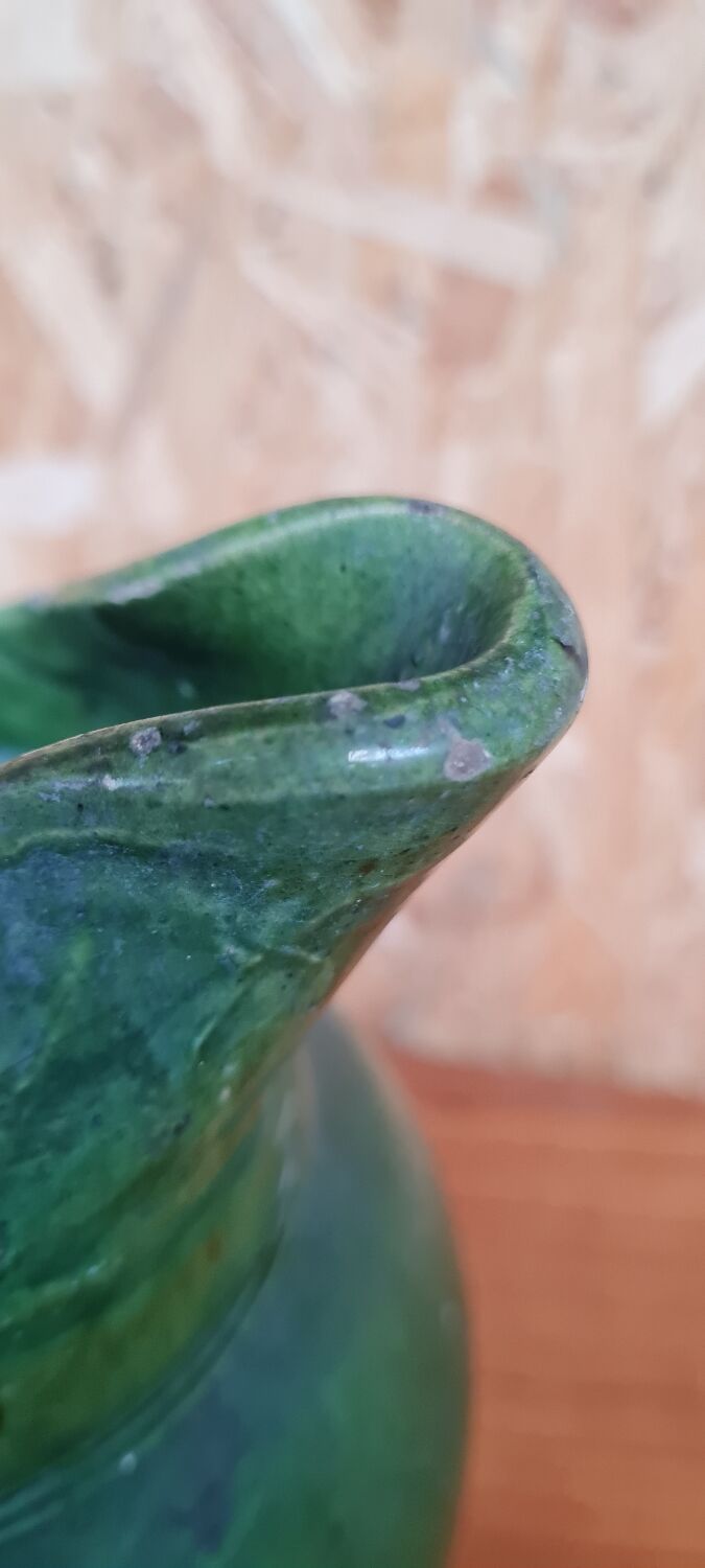 Green varnished stoneware pitcher