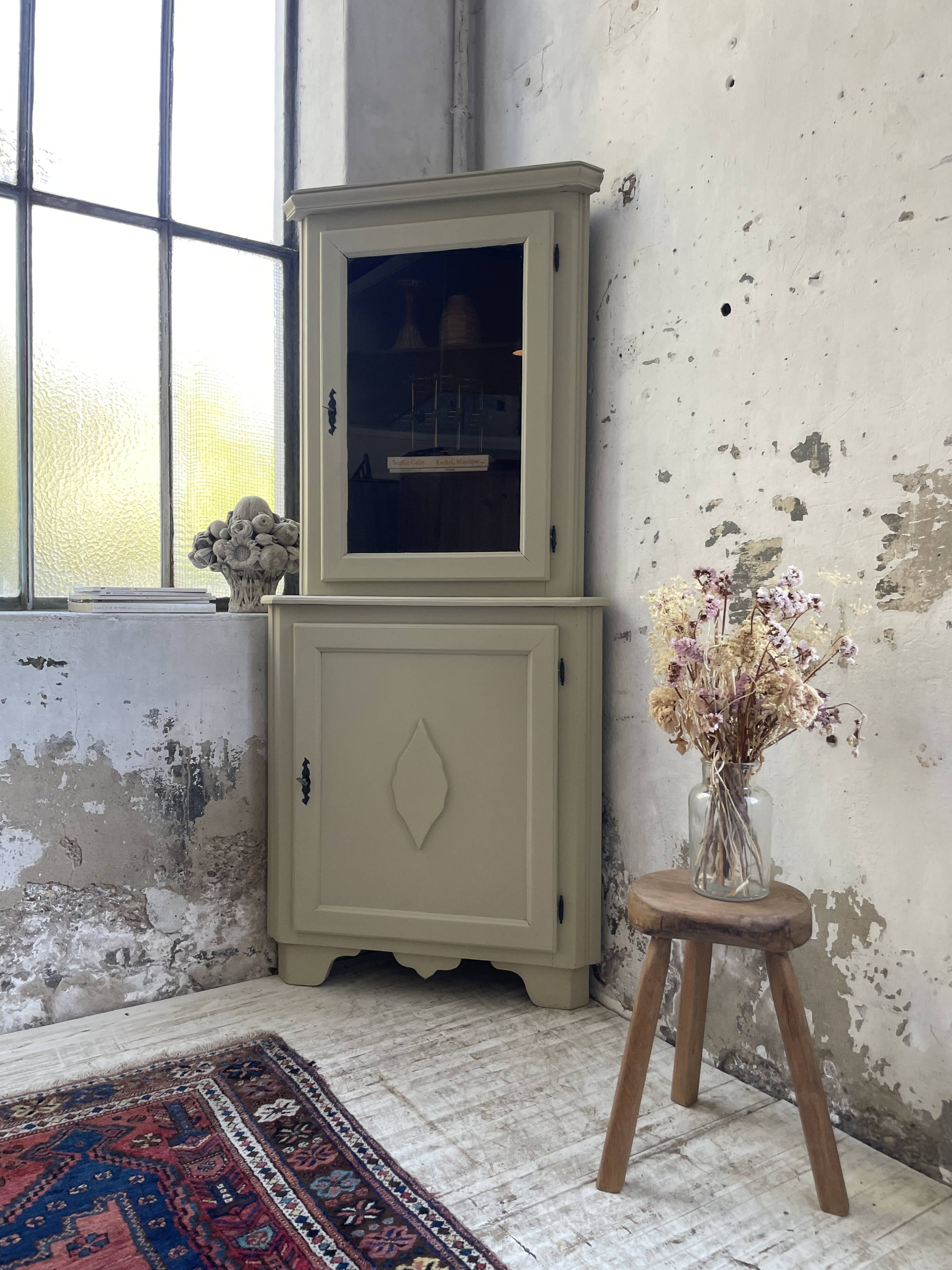 Corner display cabinet from the 1950s