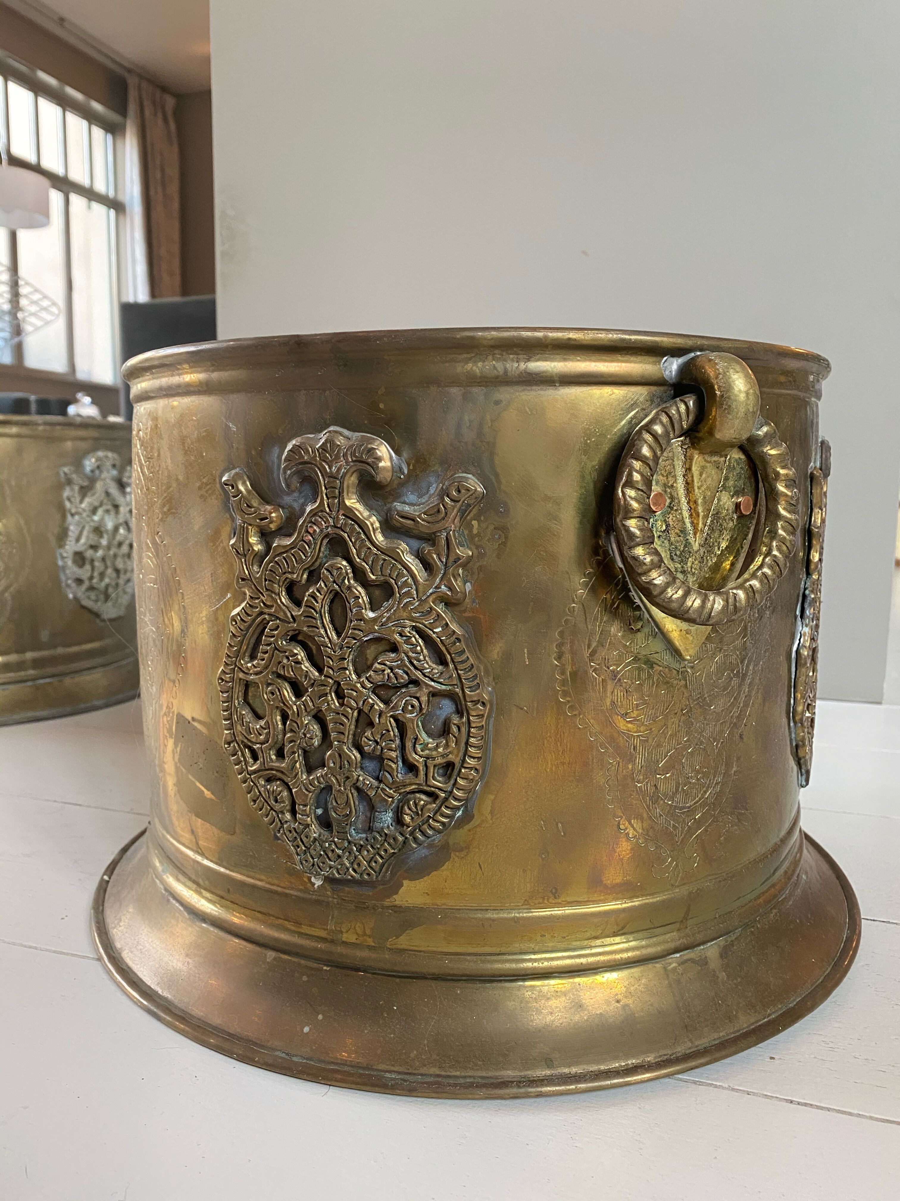 Engraved brass pot cover